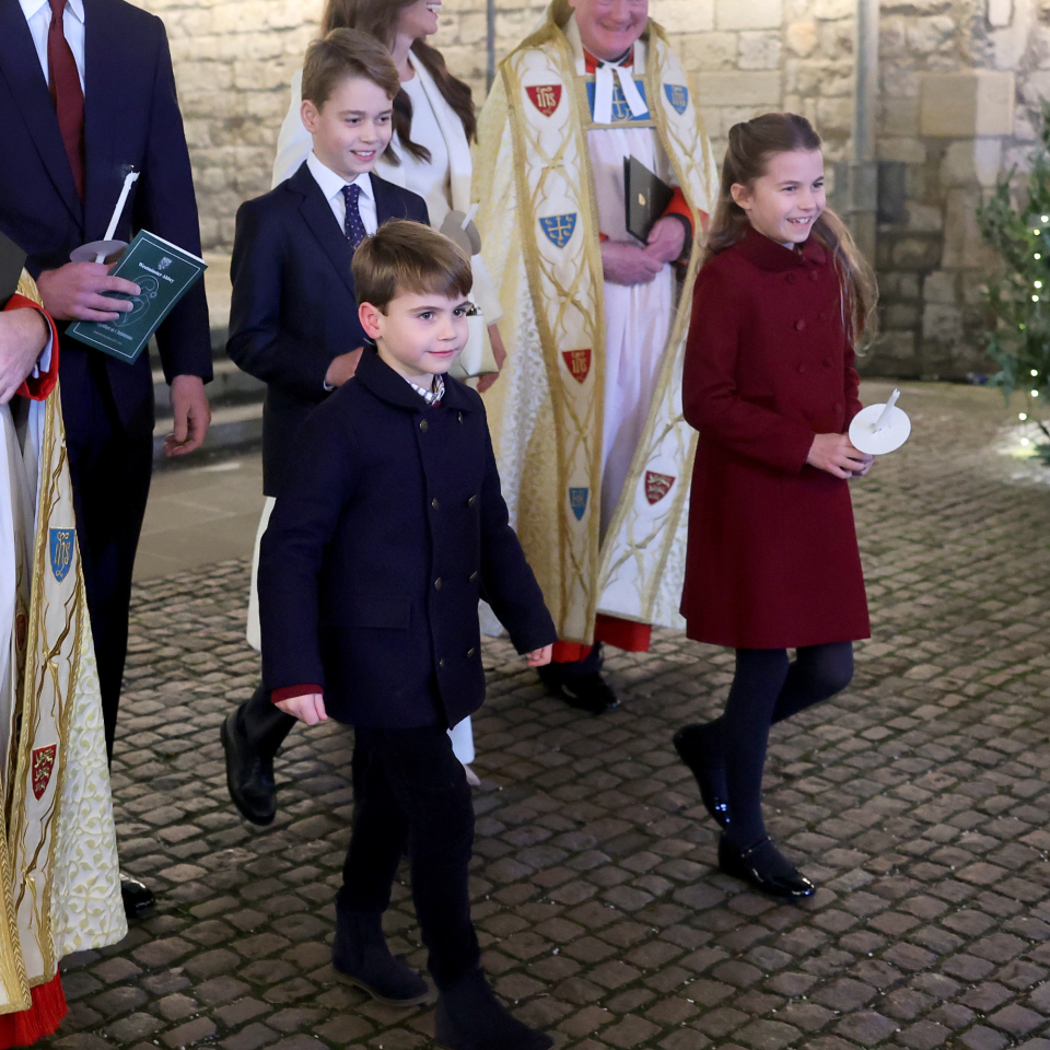 Catherine, Princess of Wales, Prince Louis of Wales, Princess Charlotte of Wales, Prince William, Prince of Wales and Prince George of Wales process out of The 