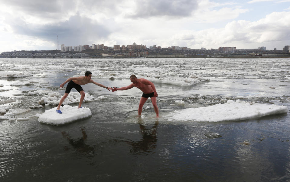 Members of a winter swimming club on ice drift on the Yenisei River in Krasnoyarsk