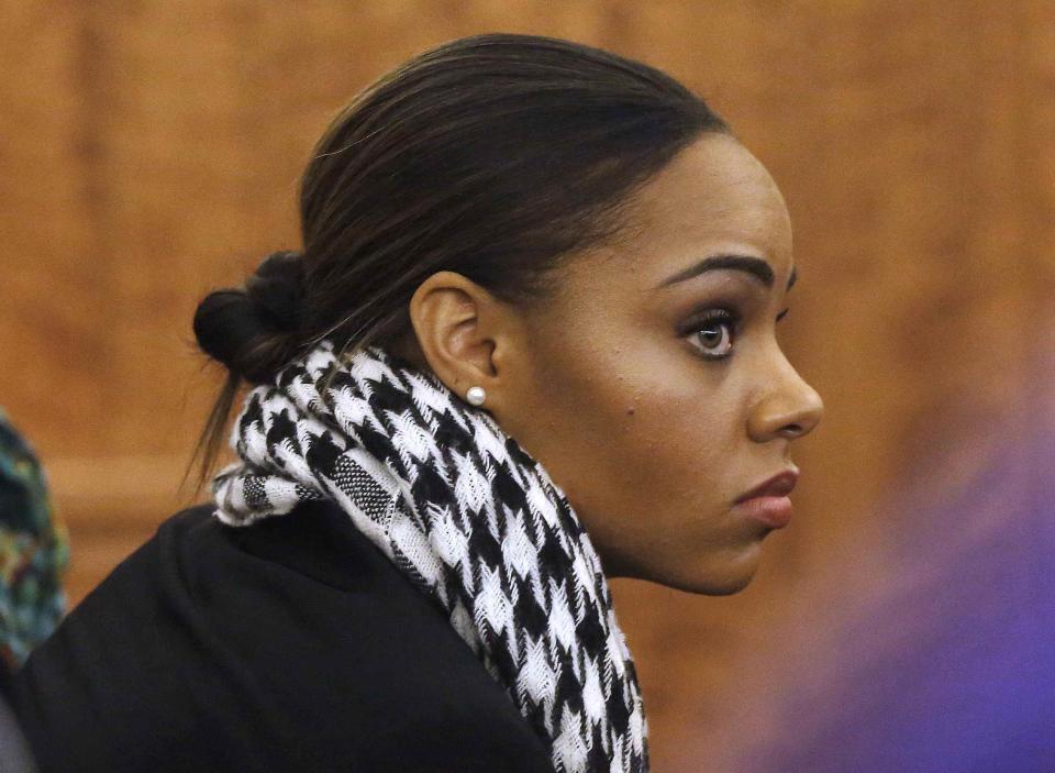 Shayanna Jenkins (R) fiancee of former New England Patriots football player Aaron Hernandez, watches during the murder trial for Hernandez, in Fall River, Massachusetts January 29, 2015. Hernandez is accused of murdering semi-professional football player Odin Lloyd. REUTERS/Steven Senne/Pool (UNITED STATES - Tags: SPORT CRIME LAW)