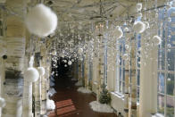 The East Colonnade of the White House is decorated for the holiday season during a press preview of holiday decorations at the White House, Monday, Nov. 28, 2022, in Washington. (AP Photo/Patrick Semansky)