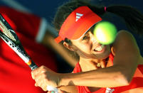 Ana Ivanovic of Serbia returns the ball to Maria Kirilenko of Russia during their Dubai WTA tennis Championships match in the Gulf emirate on February 22, 2012. AFP PHOTO/KARIM SAHIB (Photo credit should read KARIM SAHIB/AFP/Getty Images)