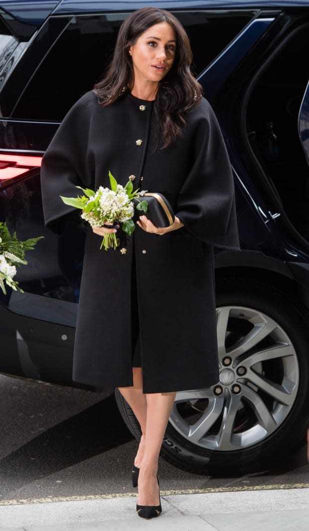 Meghan Markle, the Duchess of Sussex, in a vintage black coat during a visit to New Zealand House in London. Photo: Samir Hussein/Samir Hussein/WireImage