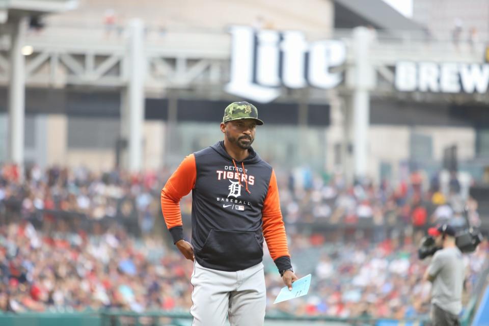 Detroit Tigers bench coach George Lombard exchanges lineup cards with the Cleveland Guardians on Friday, May 20, 2022, at Progressive Field in Cleveland, Ohio.