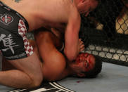 LAS VEGAS, NV - MAY 26: Stipe Miocic (top) elbows Shane Del Rosario during a heavyweight bout at UFC 146 at MGM Grand Garden Arena on May 26, 2012 in Las Vegas, Nevada.