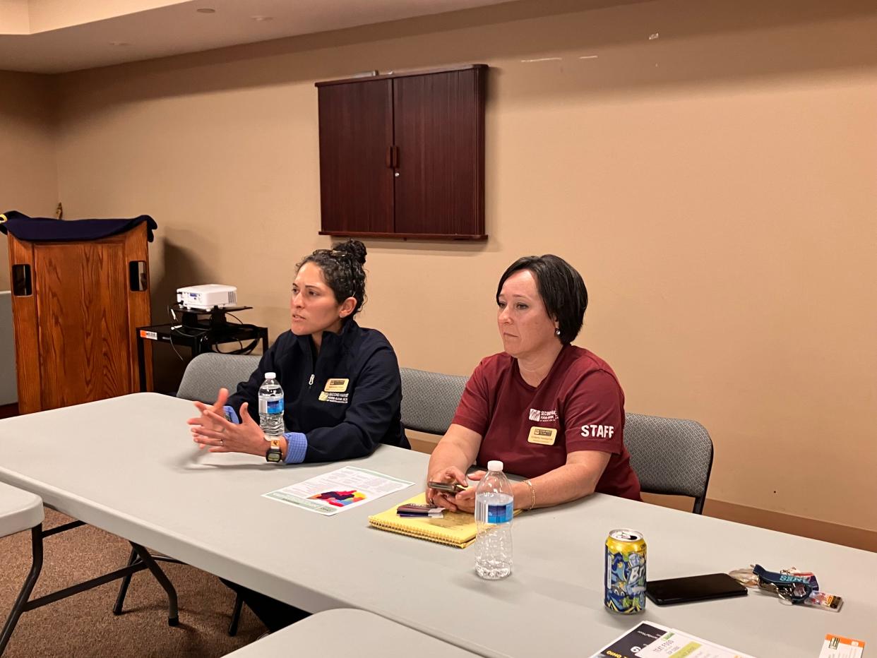 Samantha Flores, left, and Kimberly Hazelgrove lead a roundtable discussion put on by the Second Harvest Food Bank in the Bucyrus Public Library. Flores said the meeting was intended at building a stronger coalition in Crawford County, and it was successful judging by its turnout.