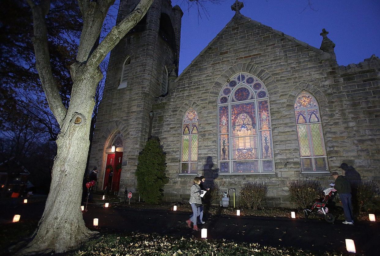 The Community Candlelight Walk returns Dec. 4 after a two-year hiatus. Nine historic downtown churches, including St. Timothy's Episcopal Church pictured here, and other downtown spots will open their doors to visitors.