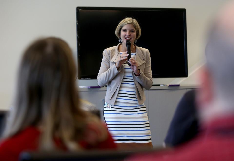 GreenPath Financial Wellness is working on two-year project, which begins in 2020, to offer virtual financial coaching to help low-to-moderate income consumers. File photo: GreenPath Financial Wellness CEO Kristen Holt talks with employees on April 20, 2016.
Eric Seals/Detroit Free Press