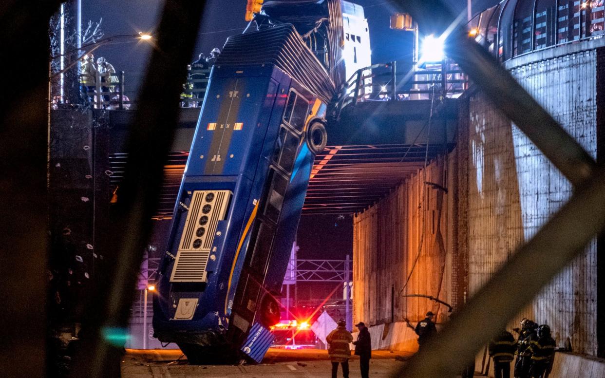 The front of the bus was smashed and hanging near-vertically - Craig Ruttle /FR61802 AP 