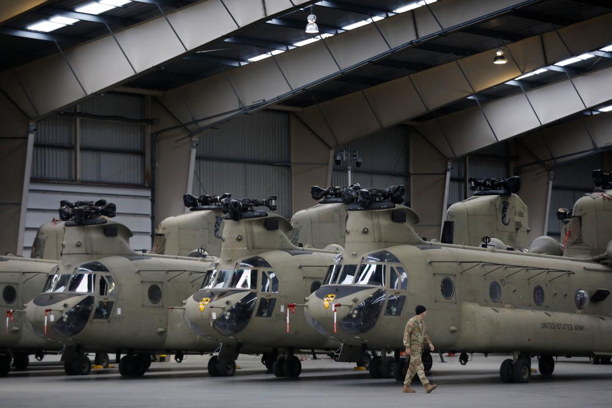 A fleet of helicopters are part of a large military transport operation between the United States and Germany