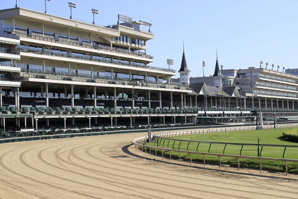 The empty stands at Churchill Downs.