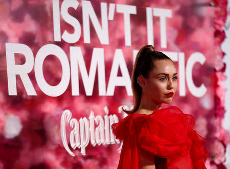 Singer Miley Cyrus poses at the premiere for the movie "Isn't It Romantic" in Los Angeles, California, U.S., February 11, 2019. REUTERS/Mario Anzuoni