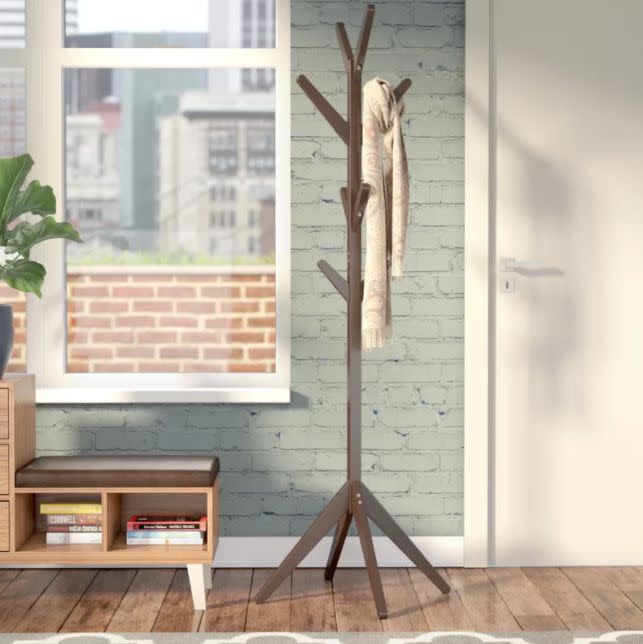 Get it <a href="https://www.allmodern.com/furniture/pdp/tree-shaped-hat-and-coat-rack-unrs1016.html?piid=21187437" target="_blank">here</a>.