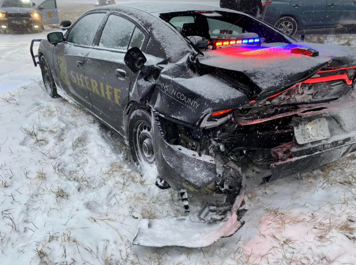 A vehicle crashed into a Johnson County Sheriff’s Office vehicle Thursday amid the winter storm which caused decreased visibility and dangerous road conditions.