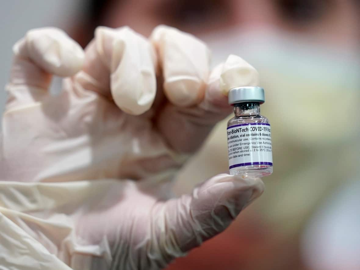 About 73.6 per cent of all Albertans, including those who are ineligible, have had two doses of COVID-19 vaccine.  (Lynne Sladky/The Associated Press - image credit)