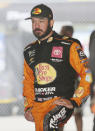Martin Truex Jr. waits in the garage for a NASCAR Cup Series auto race practice to begin on Friday, Nov. 15, 2019, at Homestead-Miami Speedway in Homestead, Fla. Truex is one of four drivers racing for the series championship. (AP Photo/David Grahm)