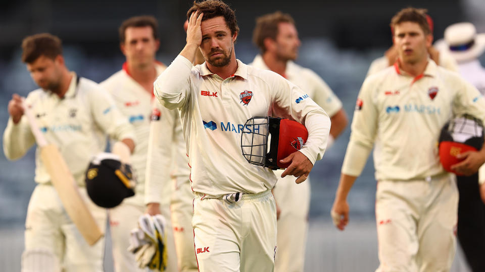 Travis Head and South Australian players, pictured here walking from the field after their draw with Western Australia.