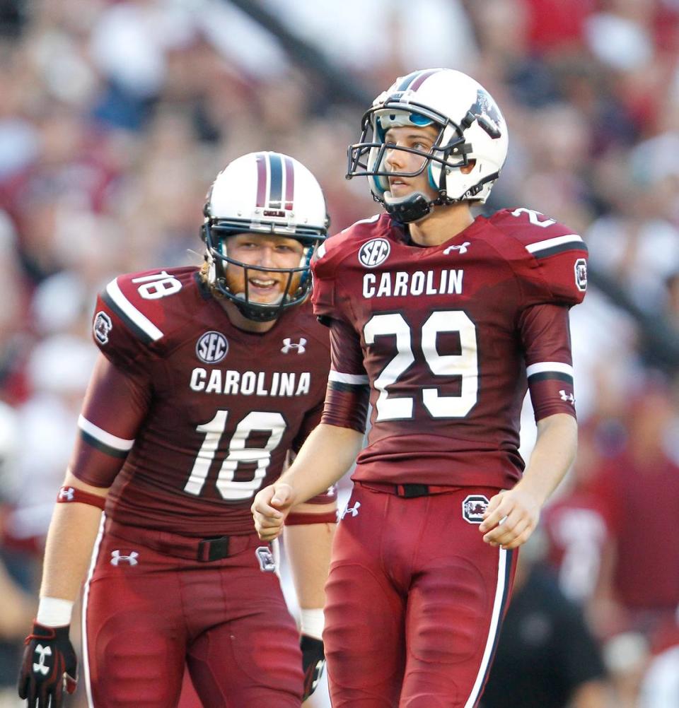 South Carolina’s Elliott Fry (29) watches a successful field goal made with Patrick Fish (18) as his holder.