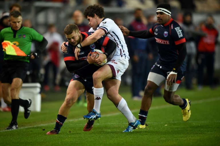 Grenoble's Loick Jammes -- holding the ball during a French league match against Bordeaux-Bègles -- is one of three grenoble players charged with gang rape