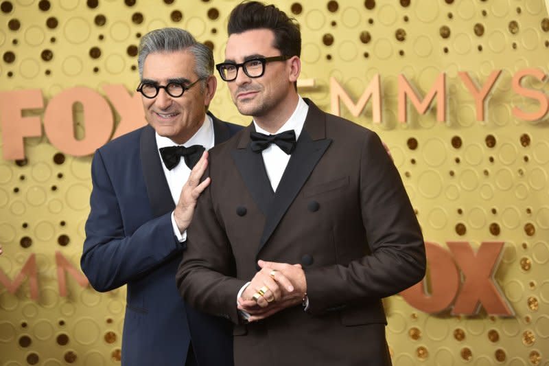 Eugene Levy (L) and son Daniel arrive for the Primetime Emmy Awards held at the Microsoft Theater in downtown Los Angeles in 2019. File Photo by Christine Chew/UPI