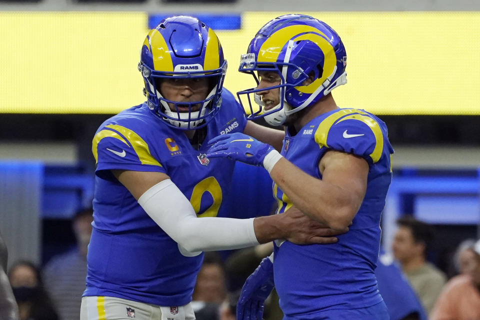 Los Angeles Rams wide receiver Cooper Kupp, right, celebrates his touchdown catch with quarterback Matthew Stafford during the second half of an NFL football game against the Jacksonville Jaguars Sunday, Dec. 5, 2021, in Inglewood, Calif. (AP Photo/Mark J. Terrill)