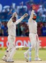 Cricket - India v New Zealand - First Test cricket match - Green Park Stadium, Kanpur - 26/09/2016. India's Virat Kohli (R) celebrates with teammates after winning the match. REUTERS/Danish Siddiqui