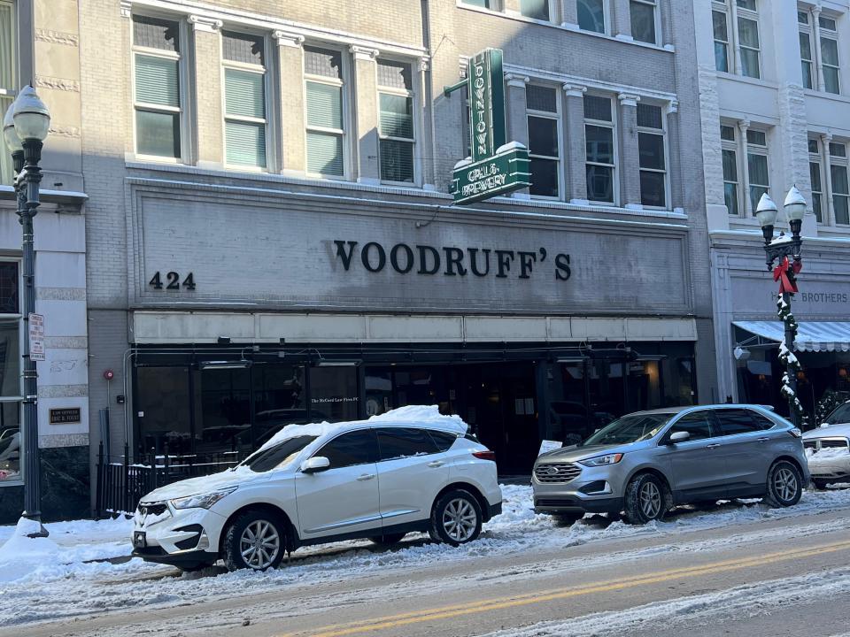 Downtown Grill and Brewery's awning collapsed from the weight of snow on Jan. 16. The Gay Street business cleared the falling awning later that morning.