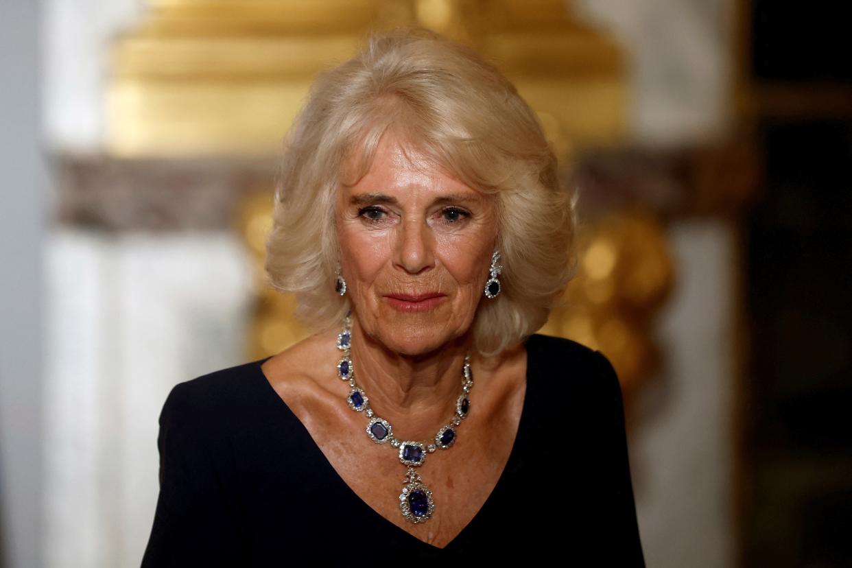 Britain's Queen Camilla attends a state dinner in the Hall of Mirrors at the Chateau de Versailles (AP)