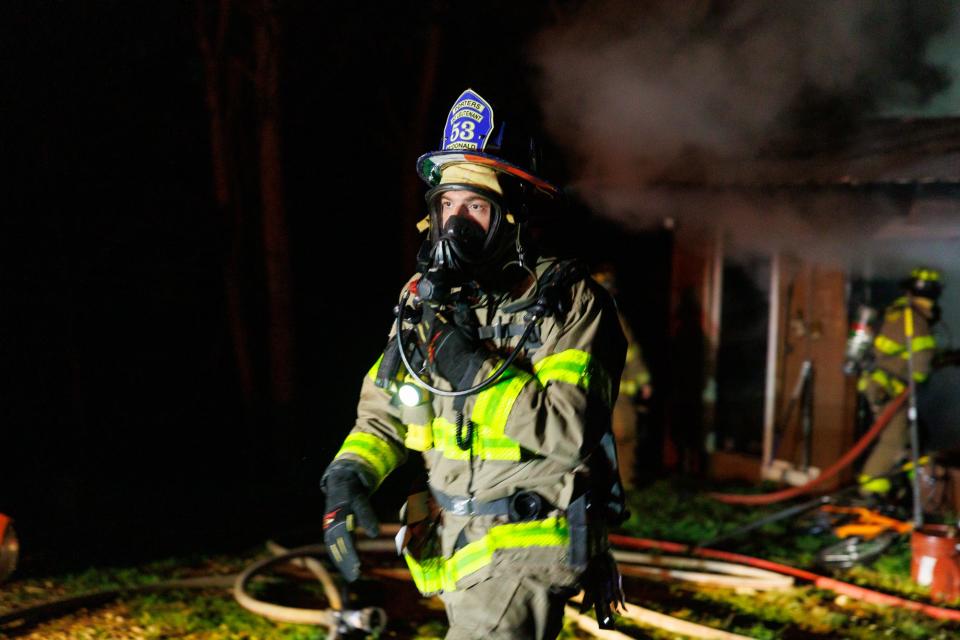 Firefighters work at the scene of a working garage fire on the 2600 block of Wilkens Lane, Saturday, July 27, 2024, in Codorus Township.