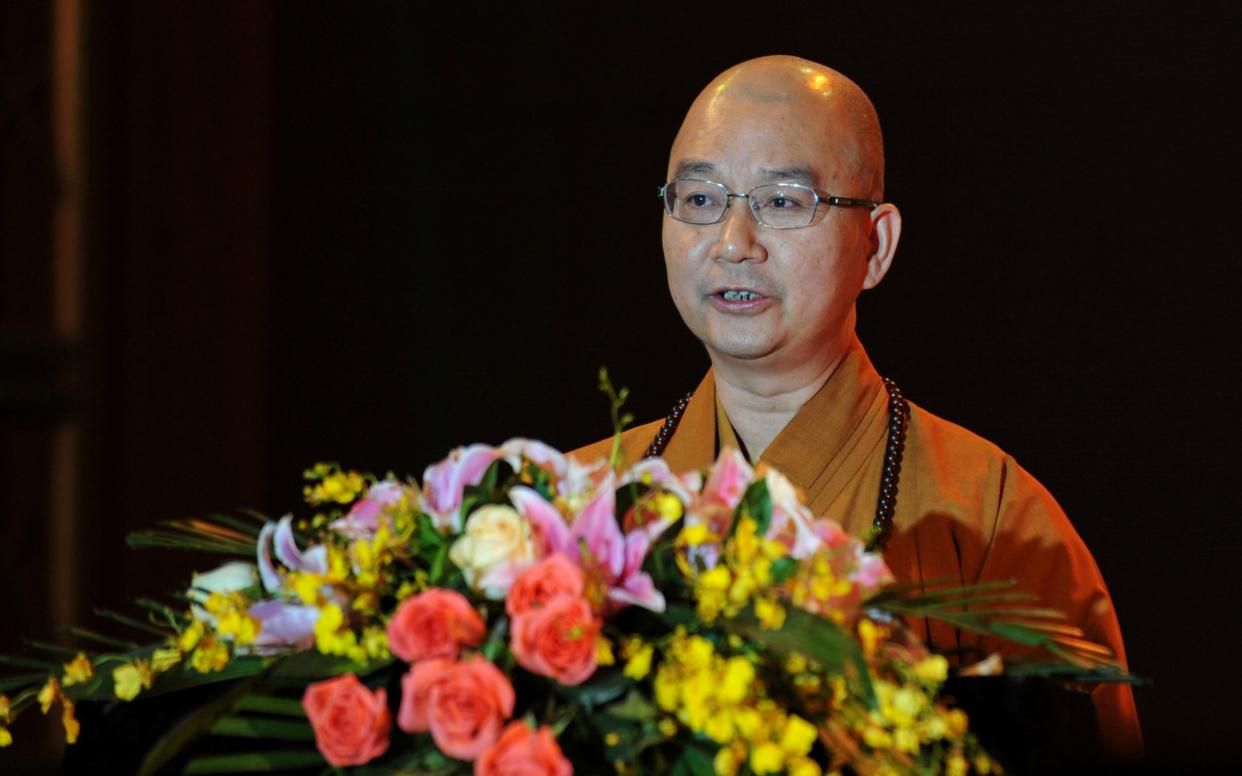 Xuecheng, the abbot of the Longquan Temple and then deputy secretary of the Buddhist Association of China, stepped down on Wednesday - REUTERS