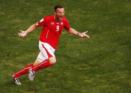 Switzerland's Haris Seferovic celebrates his goal against Ecuador during their 2014 World Cup Group E soccer match at the Brasilia national stadium in Brasilia June 15, 2014. REUTERS/David Gray\