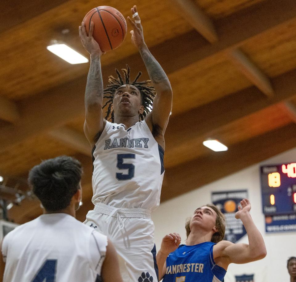 Ranney Taheen Braswell-Brown goes up with a first half shot. Ranney Boys Basketball defeats Manchester in Tinton Falls on January 26, 2022. 