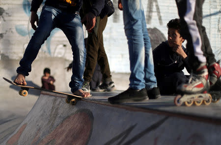 FILE PHOTO: Members of Gaza Skating Team practice their rollerblading and skating skills at the seaport of Gaza City March 8, 2019. REUTERS/Mohammed Salem