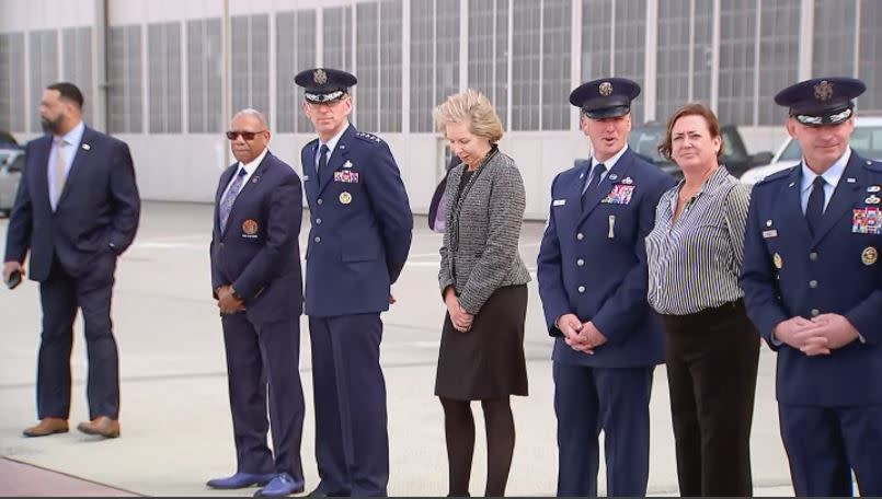 A group of local dignitaries including Dayton Mayor Jeffrey Mims, Gen. Duke Z. Richardson, CMSgt. David A. Flosi, Col. Christopher Meeker await the arrival of First Lady Dr. Jill Biden.  Eric Higgenbotham/Staff