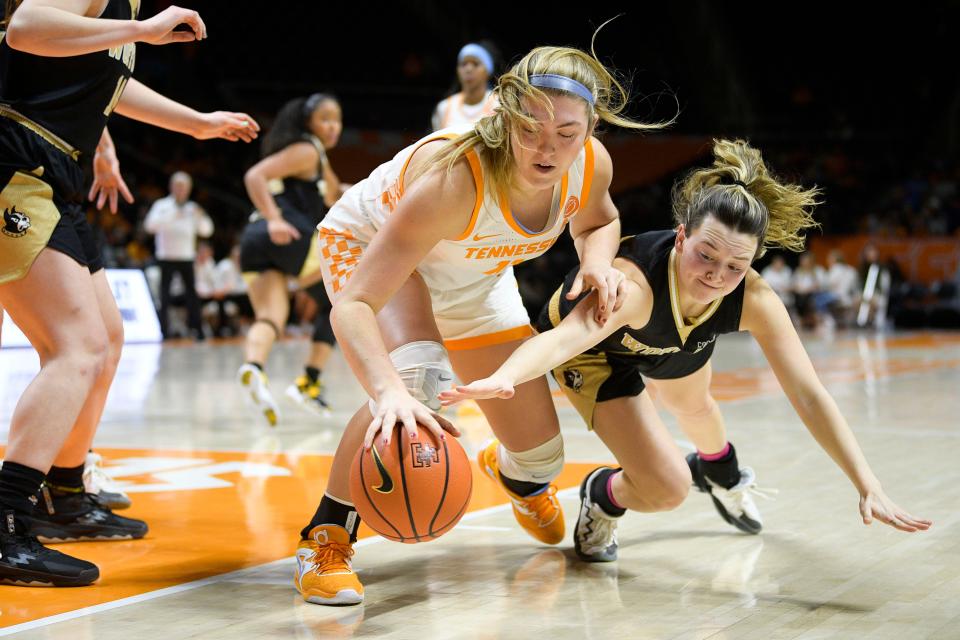 Tennessee forward Karoline Striplin (11) and Wofford guard Rachael Rose (12) battle for the ball during a game between Tennessee and Wofford at Thompson-Boling Arena in Knoxville, Tenn., on Tuesday, Dec. 27, 2022. Calvin Mattheis/News Sentinel-USA TODAY NETWORK