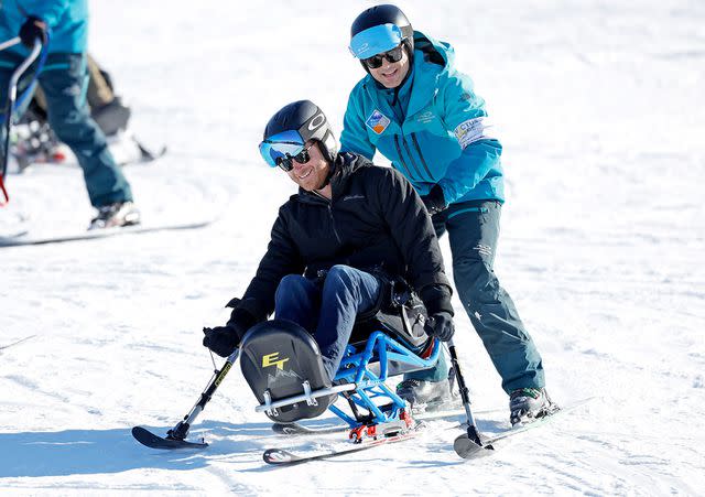 <p>Andrew Chin/Getty</p> Prince Harry tries sit-skiing on Feb. 14, 2024