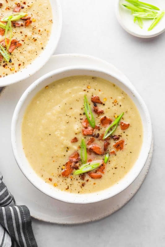 <p>Little Sunny Kitchen</p><p>A bowl of this creamy, rich, light and bright cauliflower leek soup is what you need to your menu! It’s a creamless velvety but not heavy, hearty and comforting, with a depth of flavor!</p><p><strong>Get the recipe: <a href="https://littlesunnykitchen.com/cauliflower-leek-soup/" rel="nofollow noopener" target="_blank" data-ylk="slk:Cauliflower Leek Soup;elm:context_link;itc:0;sec:content-canvas" class="link rapid-noclick-resp"><em>Cauliflower Leek Soup</em></a></strong></p>