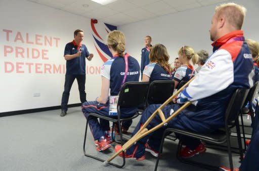Britain's Prime Minister David Cameron speaks to members of Britain's Paralympic equestrian team during a visit to the athletes village in the Olympic Park last week. Eva Loeffler, a trained physiotherapist who has dedicated much of her own life to promoting disability sport, marvels at how the Paralympics have evolved into a celebration of world-class athleticism