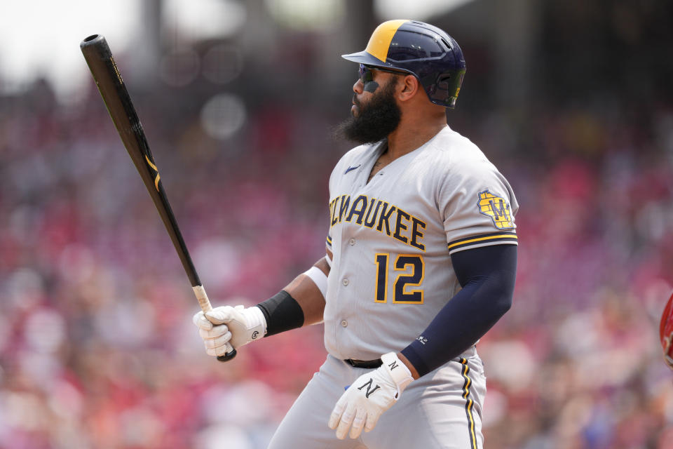 FILE - Milwaukee Brewers' Jon Singleton (12) takes an at-bat during a baseball game against the Cincinnati Reds in Cincinnati, Sunday, June 4, 2023. Singleton is being called up by the Houston Astros, returning to the team he last played for in 2015. Singleton told The Associated Press he was heading to Baltimore on Monday, Aug. 7, 2023, to join the team for the opener of a three-game series with the Baltimore Orioles, who have the best record in the American League.(AP Photo/Jeff Dean, File)