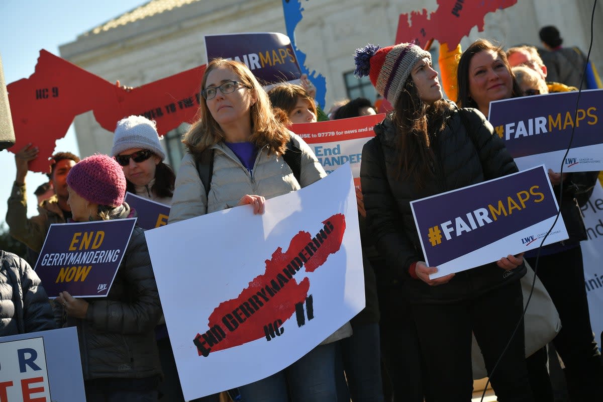 A protest in front of the US Supreme Court in 2019 demanded an end to partisan gerrymandering, the drawing of political boundaties for elections that benefit one party. A new case in front of the justices could open the door for state lawmakers to increased gerrymandering.  (AFP via Getty Images)