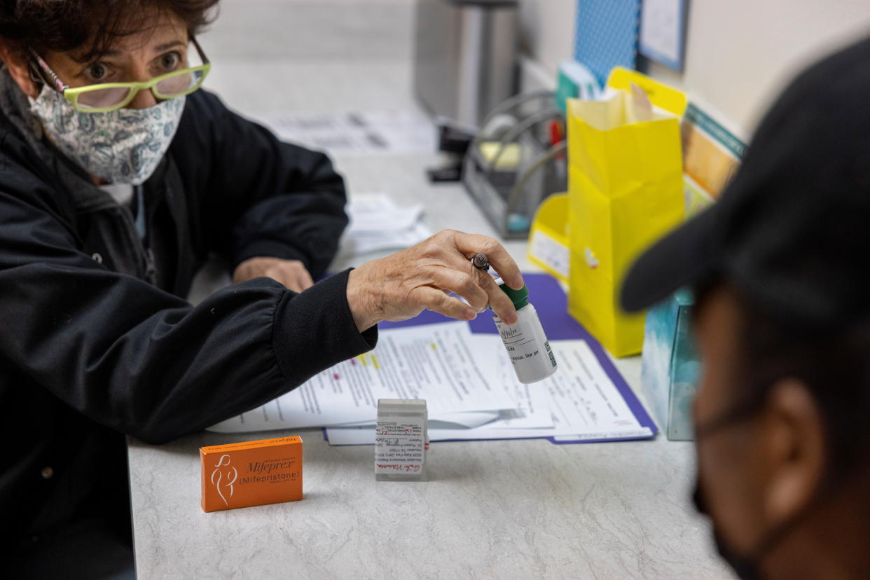 Marjie Eisen, a counselor at Houston Women's Reproductive Services, offers counseling to a patient prior to her taking the first pill at the clinic for her medical abortion, in Houston, September, 30, 2021. REUTERS/Evelyn Hockstein