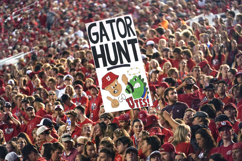 Utah fans hold a sign during the first half of the team's NCAA college football game against Florida on Thursday, Aug. 31, 2023, in Salt Lake City. (AP Photo/Rick Bowmer)