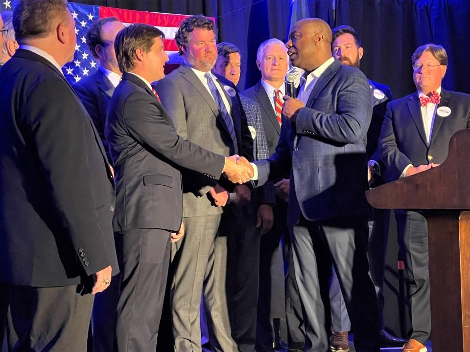 U.S. Sen. and GOP presidential hopeful Tim Scott announced Monday he has been endorsed by some 140 elected state leaders, including Spartanburg City Councilman Rob Rain, shaking his hand. The event was held at the AC Hotel by Marriott Spartanburg.