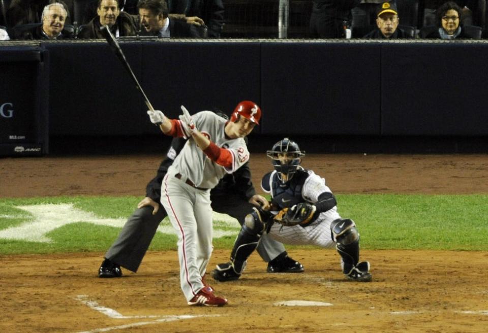 Chase Utley clubs a solo home run against the New York Yankees in Game 1 of the 2009 World Series, one of five he hit in a losing effort.