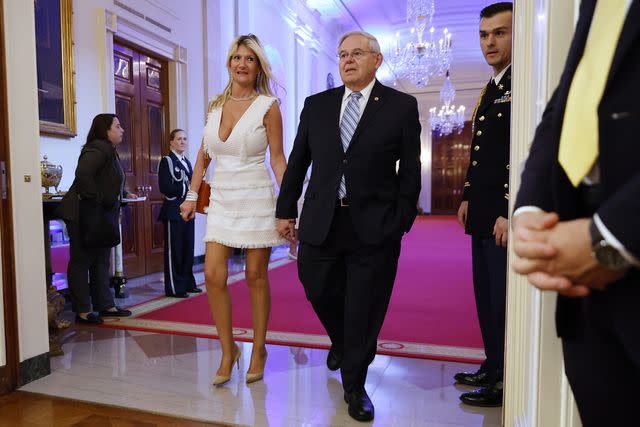 <p>Chip Somodevilla/Getty</p> Sen. Bob Menendez and his wife, Nadine, arrive for a reception in the White House East Room on May 16, 2022
