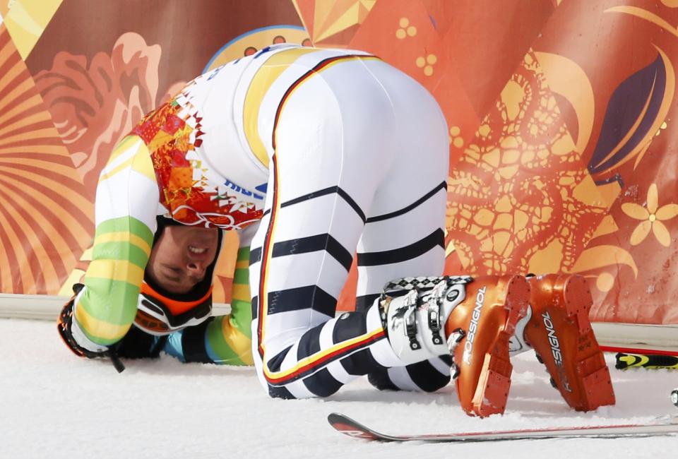 Germany's Stefan Luitz reacts after crashing into the last gate and being disqualified, during the first run of the men's alpine skiing giant slalom event in the Sochi 2014 Winter Olympics at the Rosa Khutor Alpine Center February 19, 2014. REUTERS/Mike Segar (RUSSIA - Tags: OLYMPICS SPORT SKIING)