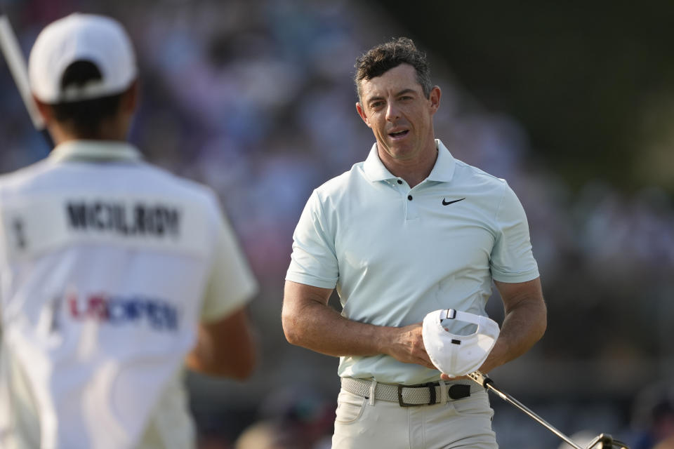 Rory McIlroy, of Northern Ireland, reacts after missing a putt on the 18th hole during the final round of the U.S. Open golf tournament Sunday, June 16, 2024, in Pinehurst, N.C. (AP Photo/Matt York)