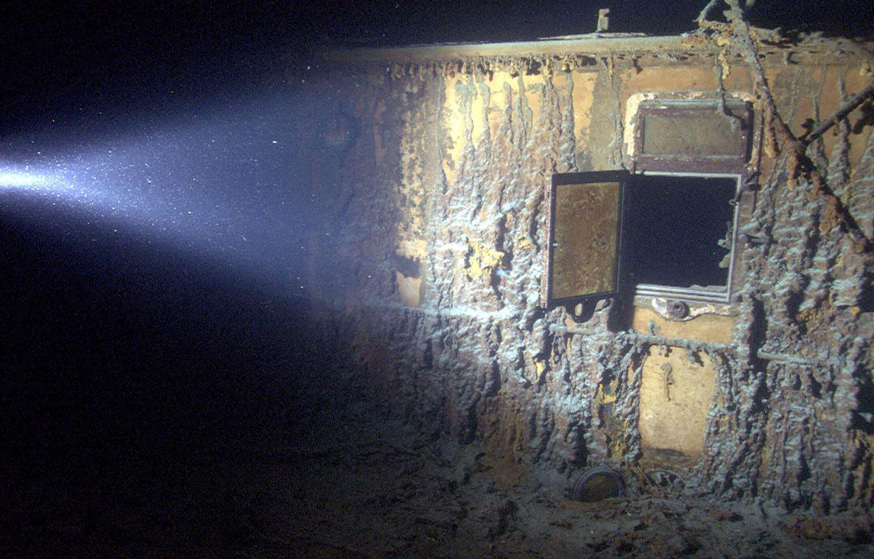 Image: An open hatch on Titanic's hull during a 2003 expedition. (Ghosts of the Abyss via Alamy)