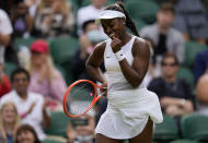 Sloane Stephens of the US celebrates winning the women's singles match against Czech Republic's Petra Kvitova on day one of the Wimbledon Tennis Championships in London, Monday June 28, 2021. (AP Photo/Kirsty Wigglesworth)