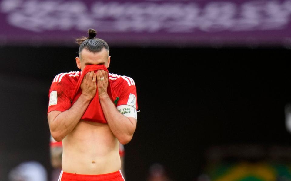 Wales' Gareth Bale reacts at the end of the World Cup group B soccer match between Wales and Iran, at the Ahmad Bin Ali Stadium in Al Rayyan - AP