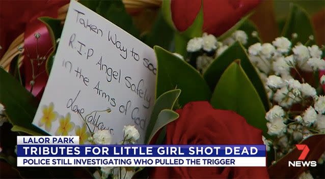 Cards and flowers laid outside the house where the little girl died. Source: 7 News